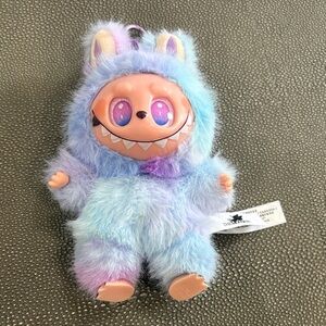Plush Monster Toy with Blue and Purple Fur